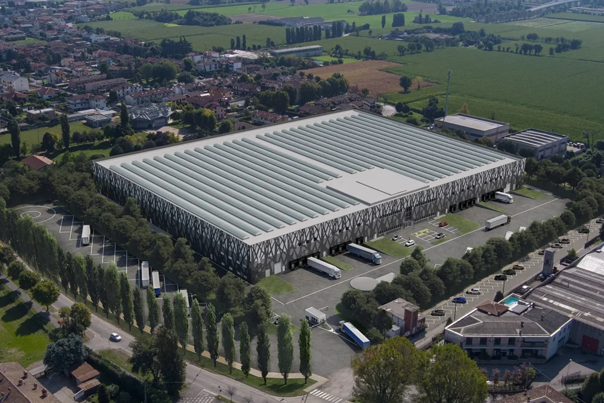 Magazzino vista dall alto con la città zoommata mileast logistics park polo logistico tra brescia bergamo e milano - Mileast Logistics Park