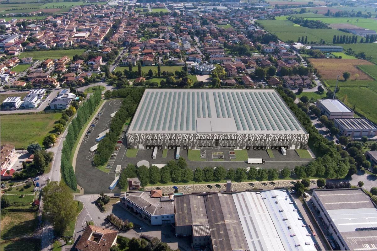 Magazzino vista dall alto frontalmente con città mileast logistics park polo logistico tra brescia bergamo e milano - Mileast Logistics Park
